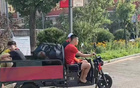 譚龍座駕：三蹦子赴訓